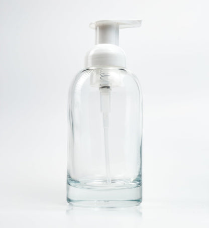 Glass bottle with foaming pump dispenser