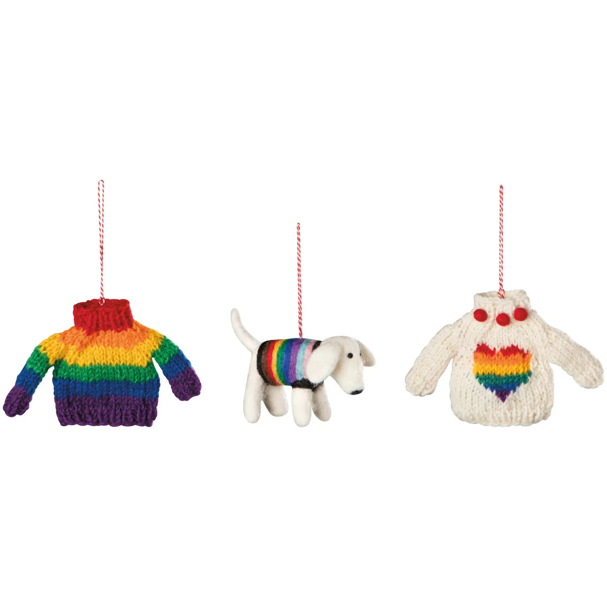 Three Christmas ornaments on a white background