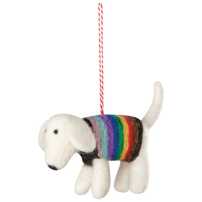 Dog-shaped ornament with a rainbow sweater on a white background